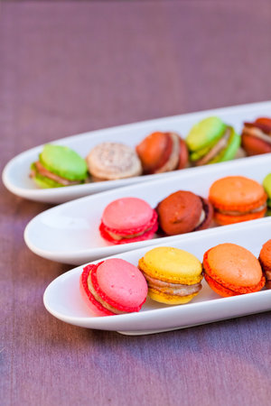 Colorful macaron isolated on a purple backgroundの写真素材