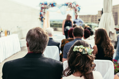 Beautiful wedding ceremony. Guests are waiting for groom and brideの写真素材