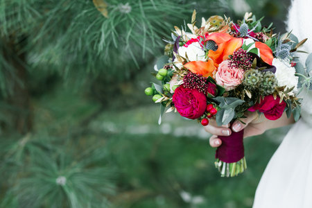 marsala rustic wedding bouquet with red rose with cope spaceの写真素材