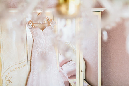 White Wedding dress on a shoulders, before ceremonyの写真素材