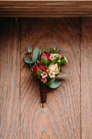 Boutonniere groom on a wooden backgroundの写真素材