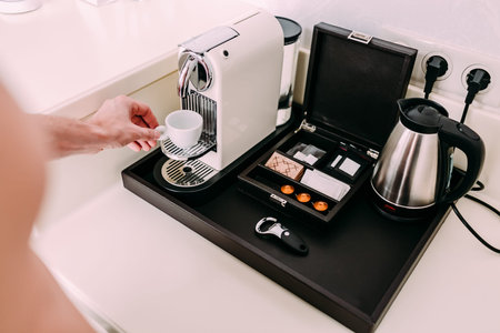 Coffee preparation concept at home by a coffee machine. Close-up.の写真素材