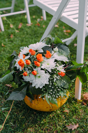 Decorating a wedding with autumn pumpkin. Close-up, outdoorの写真素材