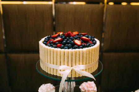 Candy Bar. Delicious sweet buffet with cupcakes and heart-shaped biscuit, chocolates, and strawberry and other desserts. Table decorationの写真素材