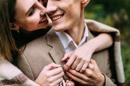 Happy, smiling couple is tenderly hugging. Close-up portraits. Wedding. Artworkの写真素材