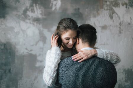 Young couple in love. Close-up portrait. Indoorsの写真素材