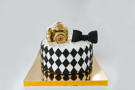 Black and White Birthday Cake For Photographer On White Background.の写真素材