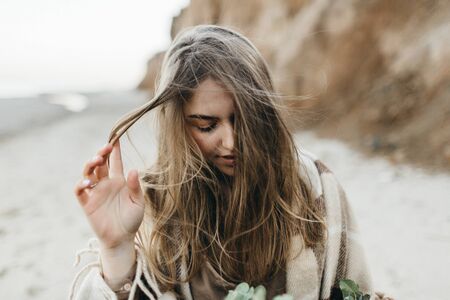 Portrait of beautiful girl with fluttering hair walk alone. Close-up, artwork. Soft focus