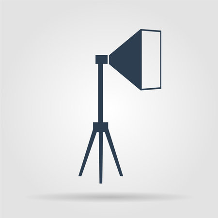 studio light icon, isolated, white on the blue background. Exclusive Symbolsのイラスト素材