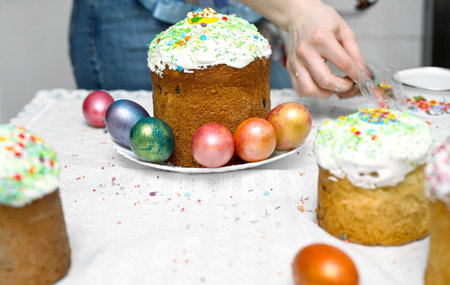 Holiday Easter preparing decorated eggs baking cake glaze