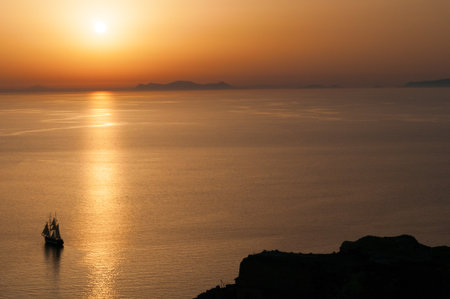 Beautiful, gold Santorini Island Sunset, Greeceの写真素材
