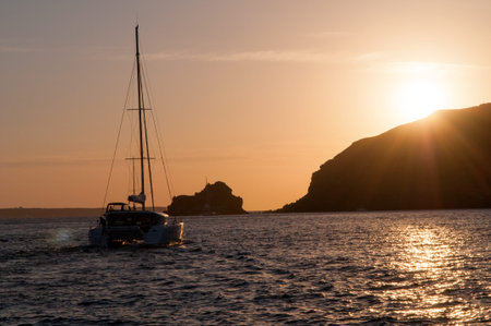 Sunset view from the boat,  Santorini island, Greece