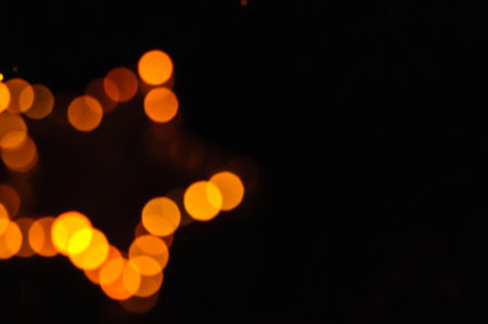 Defocused abstract christmas background, out of focus light spots forming a soft backgroundの写真素材