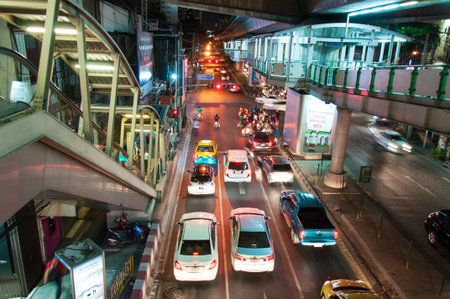 Bangkok, Thailand - May 22, 2014  Night scenery with heavy traffic near a Skytrain station in Bangkok, Thailand on May 22, 2014のeditorial素材