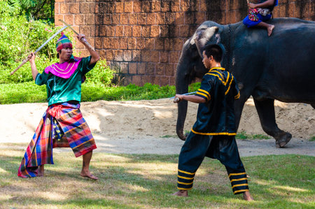 Nakhon Pathom, Thailand - May 24, 2014: Fighters exercise for Thai traditional martial demonstration...