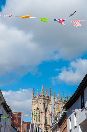 Festive Street view with York Minster towers in background in the historical city of York, North Yorkshire, UKの写真素材