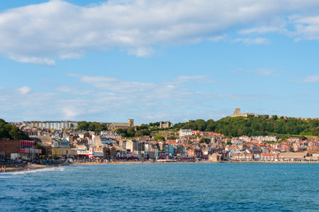 Scarborough, North Yorkshire, England - August 24, 2014: View over Scarborough South Bay harbor.The town has fishing and service industries and is the largest holiday resort on the Yorkshire coast, one of the famous tourist destinations in England.のeditorial素材