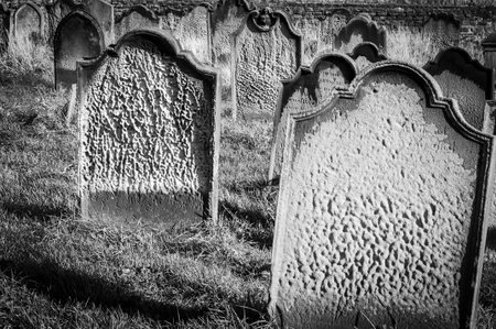 Tomb stones at Whitby cemetery during the night in North Yorkshire,UK. Its attraction as a tourist...