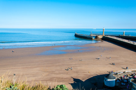  View of Whitby beach in a sunny autumn day.Whitby is a seaside town and port in North Yorkshire, UK. の写真素材