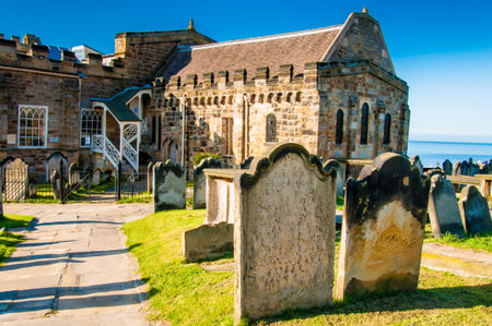 Whitby, North Yorkshire, UK - October 12, 2014: View of St Mary's Church, gravestones and Whitby Abbey in North Yorkshire, UKのeditorial素材