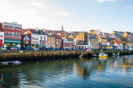 Whitby, North Yorkshire, UK - October 12, 2014: Scenic view of Whitby city in autumn sunny day.Whitby's attraction as a tourist destination is enhanced by its association with the world famous horror novel Dracula, written by Bram Stokerのeditorial素材
