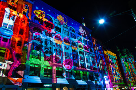 Melbourne, Australia - 21 February 2015: Art colorful projections over historical buildings. More then 500,000 people joined annual Melbourne's White Night cultural festival in 21 February, Melbourne, Australiaのeditorial素材