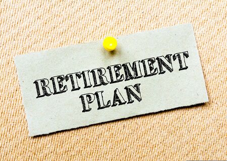 Recycled paper note pinned on cork board. Retirement Plan. Concept Imageの写真素材
