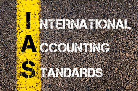 Business Acronym IAS  International Accounting Standards.
Yellow paint line on the road against asphalt background. Conceptual imageの写真素材