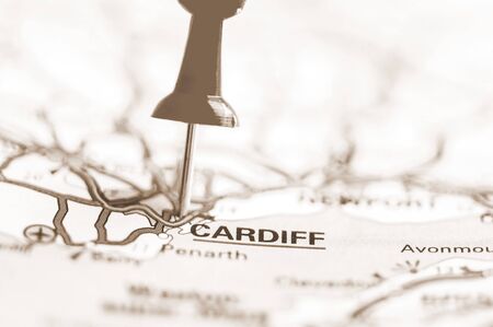 Pushpin showing Cardiff City On Map, Wales with vintage sepia filter effectの写真素材