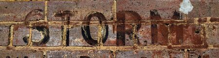 Word Storm with vintage writing on brick wallの写真素材