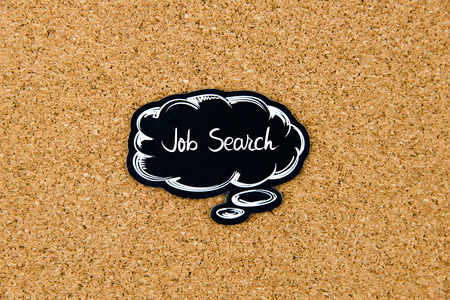 Job Search written on black thinking bubble over cork board background, copy space availableの写真素材