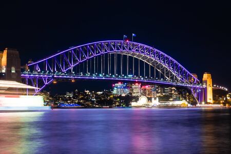 SYDNEY - June 10, 2016: Sydney Harbour Bridge in the night illuminated during Vivid Sydney Festival. Vivid Sydney is an annual outdoor Festival of Light, Music & Ideas in Sydney, Australiaのeditorial素材