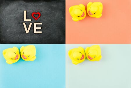Photo Collage of Pair of yellow rubber ducks isolated over colorful background, love conceptの写真素材