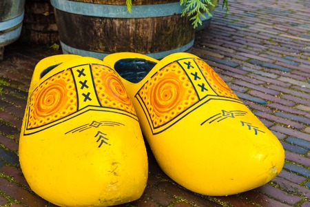 Zaanse Schans, Netherlands - January 10, 2017: Traditional handmade Dutch wooden shoes in Zaanse Schans village near Amsterdam, Netherlands. Klompen are whole feet clogs made of willow or poplar.のeditorial素材