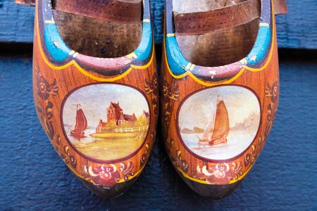 Zaanse Schans, Netherlands - January 10, 2017: Traditional handmade Dutch wooden shoes in Zaanse Schans village near Amsterdam, Netherlands. Klompen are whole feet clogs made of willow or poplar.のeditorial素材