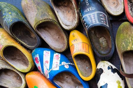 Zaanse Schans, Netherlands - January 10, 2017: Traditional handmade Dutch wooden shoes in Zaanse Schans village near Amsterdam, Netherlands. Klompen are whole feet clogs made of willow or poplar.のeditorial素材