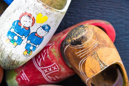 Zaanse Schans, Netherlands - January 10, 2017: Traditional handmade Dutch wooden shoes in Zaanse Schans village near Amsterdam, Netherlands. Klompen are whole feet clogs made of willow or poplar.のeditorial素材