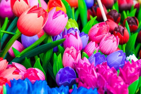 Wooden tulips souvenirs painted in vivid colours in Amsterdam, the Netherlandsの写真素材