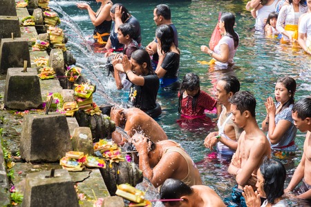 Bali, Indonesia - May 1, 2017: Tirta Empul Temple is a Hindu Balinese water temple famous for its holy spring water, where Balinese Hindus go for ritual purification near Tampaksiring, Bali, Indonesiaのeditorial素材