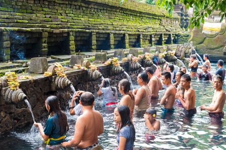 Bali, Indonesia - May 1, 2017: Tirta Empul Temple is a Hindu Balinese water temple famous for its holy spring water, where Balinese Hindus go for ritual purification near Tampaksiring, Bali, Indonesiaのeditorial素材