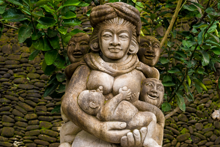Bali, Indonesia - May 1, 2017: Traditional statue at Tirta Empul, a Hindu Balinese water temple famous for its holy spring water, near Tampaksiring, Bali, Indonesiaのeditorial素材