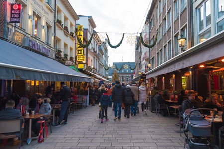 Dusseldorf, Germany - November 27, 2017 : Street view of historical old city Altstadt district. Dusseldorf is an international business and financial centre, renowned for its fashion and trade fairs.のeditorial素材