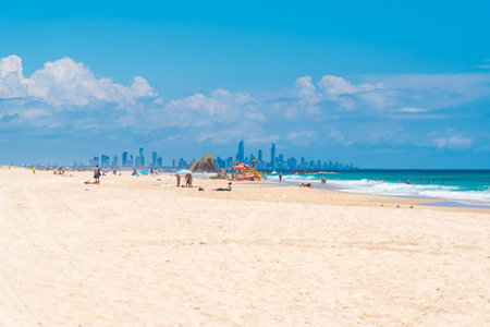 Currumbin, Queensland, Australia-December 23, 2017 : Coastal sand beach with Gold Coast skyline from Surfers Paradise on the horizon, a major tourist destination with subtropical climate.のeditorial素材