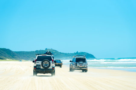 Rainbow Beach, QLD, Australia- December 30, 2017: 4wd vehicles at Rainbow Beach, a popular tourist...