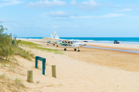 Fraser Island, QLD, Australia - December 31, 2017: Aircrafts with tourists at Pinnacles, one of the most popular landmarks on Fraser Island, a World Heritage Site since 1992 in Queensland, Australia.のeditorial素材
