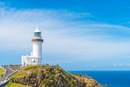 Byron Bay, NSW, Australia- January 3, 2018: Ocean view over Cape Byron lighthouse, the Most Easterly Point on the Australian Mainland in Byron Bay, Australia. Unidentified tourists in the background.のeditorial素材