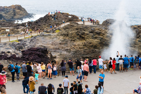 Kiama, NSW, Australia-March 31, 2018: Tourists visiting Kiama Blowhole, one of the largest blowholes...