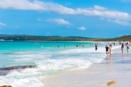 Hyams Beach, NSW, Australia-March 31, 2018: People enjoying the sunny weather at Hyams Beach with fine white sand, a charming seaside village in Shoalhaven region on the South Coast of NSW, Australiaのeditorial素材