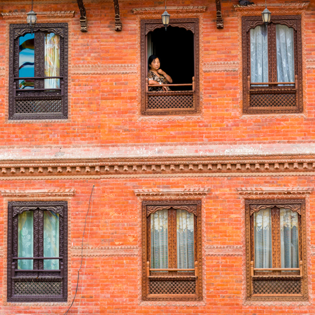 Kathmandu, Nepal - July 15, 2018 : Traditional building facade at Boudhanath ( Boudha ) Stupa complex, a UNESCO heritage site and an important place of pilgrimage for Buddhists all over the worldのeditorial素材