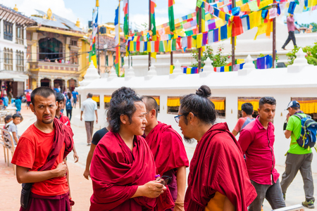 Kathmandu, Nepal - July 15, 2018 : Buddhist monks at Boudhanath ( Boudha ) Stupa, a UNESCO heritage site and an important place of pilgrimage and worship for Buddhists all over the world.のeditorial素材